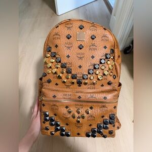 MCM Cognac Backpack with Gold and Black Studs